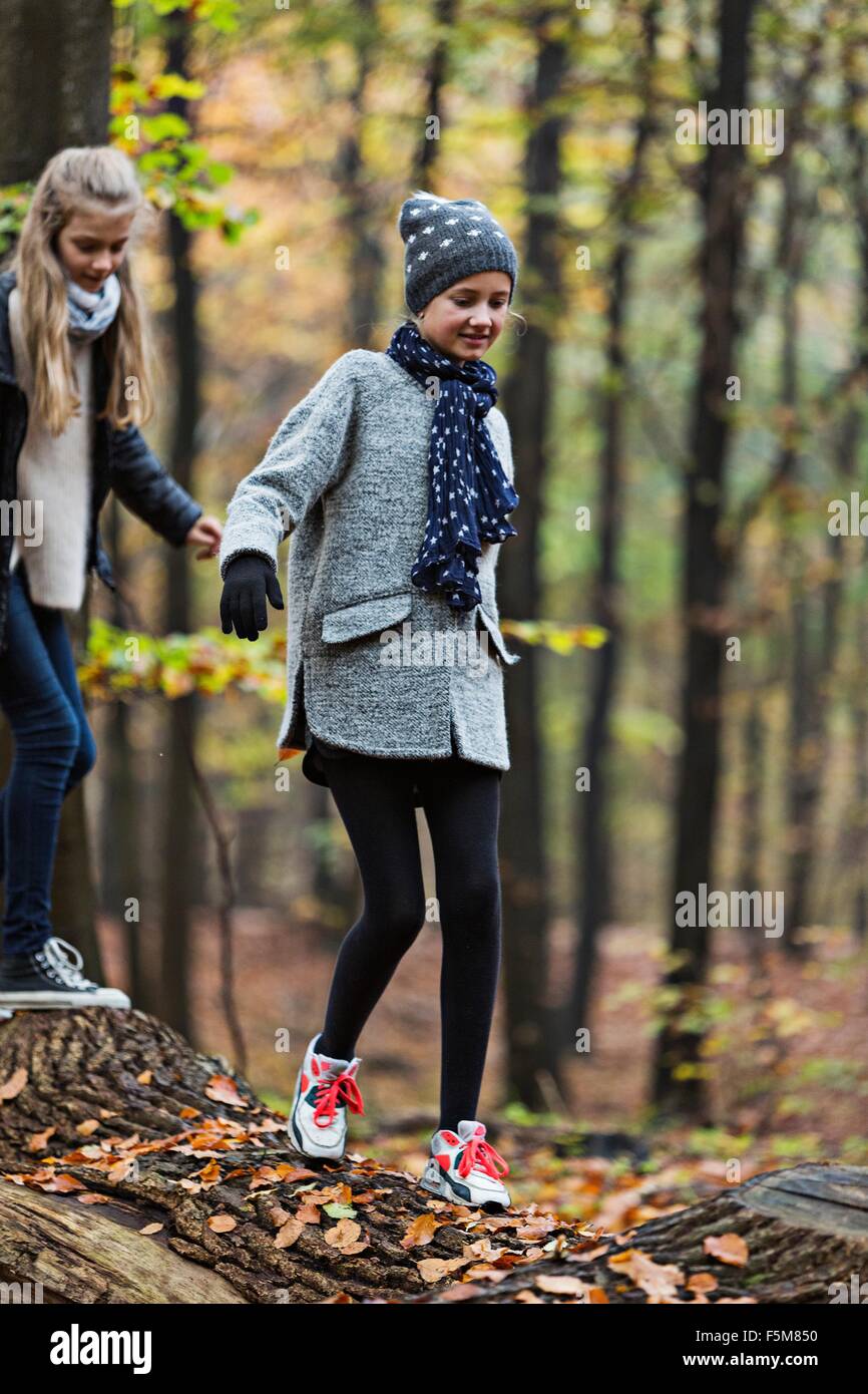 Two girls walking away hi-res stock photography and images - Alamy
