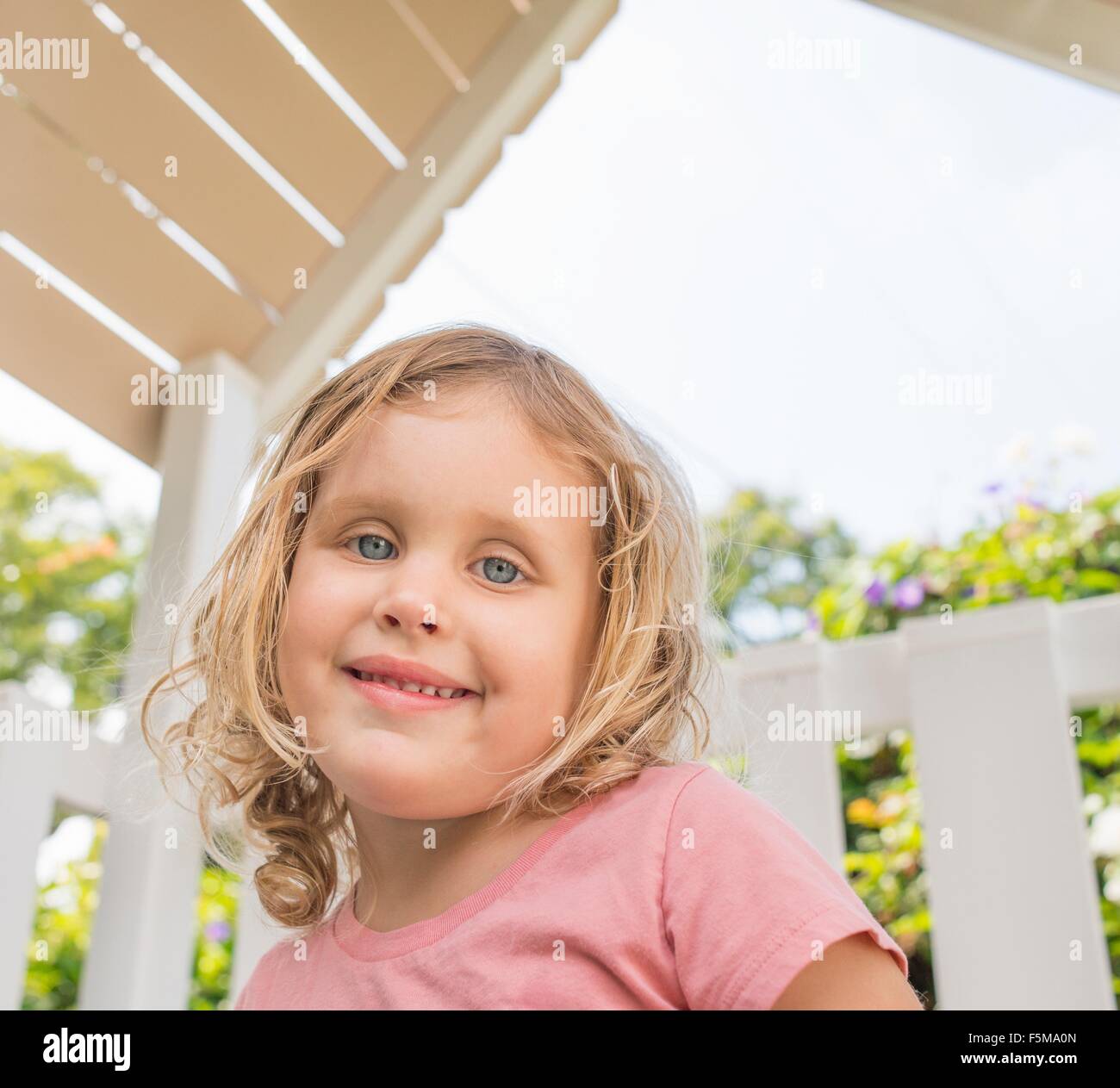 Portrait of young girl, smiling, outdoors Stock Photo - Alamy