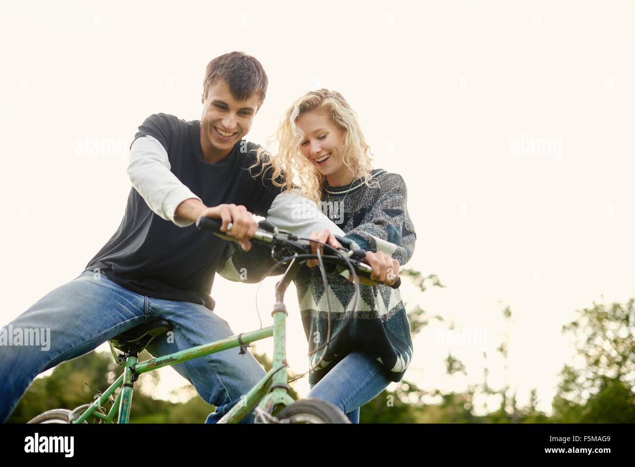 Young couple with bicycle Stock Photo