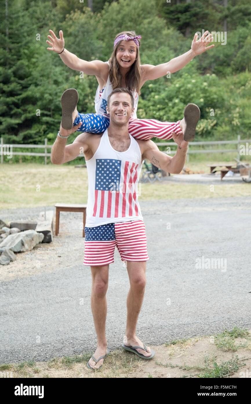 Portrait of couple wearing American flag costume celebrating