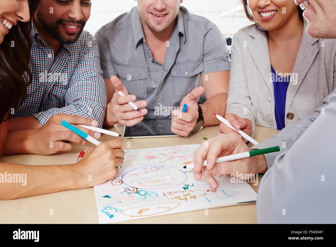 Small group of people having brainstorming business meeting Stock Photo