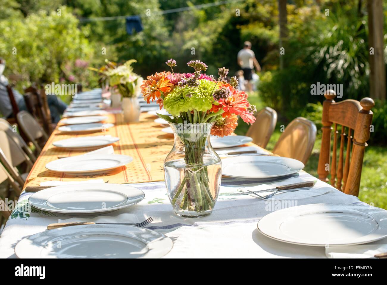 Table setting for large family at tomato eating festival Stock Photo