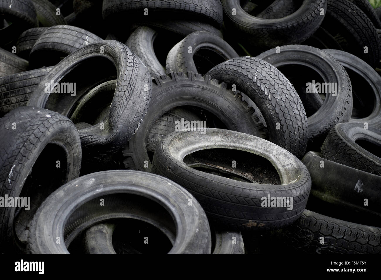 Pile of used tyres Stock Photo