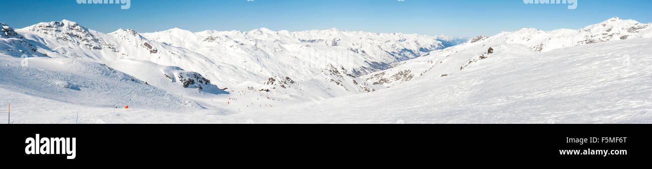 Panoramic view down a snowy mountain range valley in winter Stock Photo ...