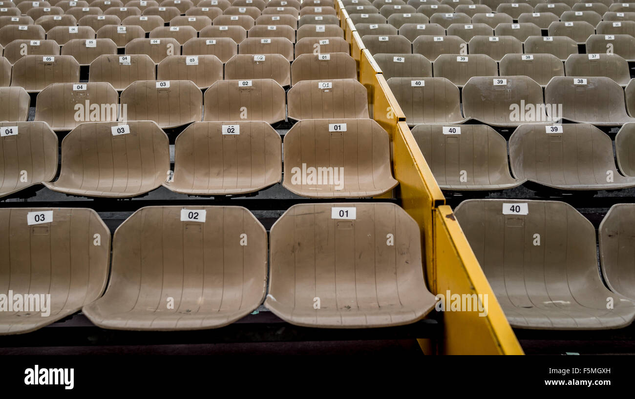 Rows of empty stadium seats Stock Photo