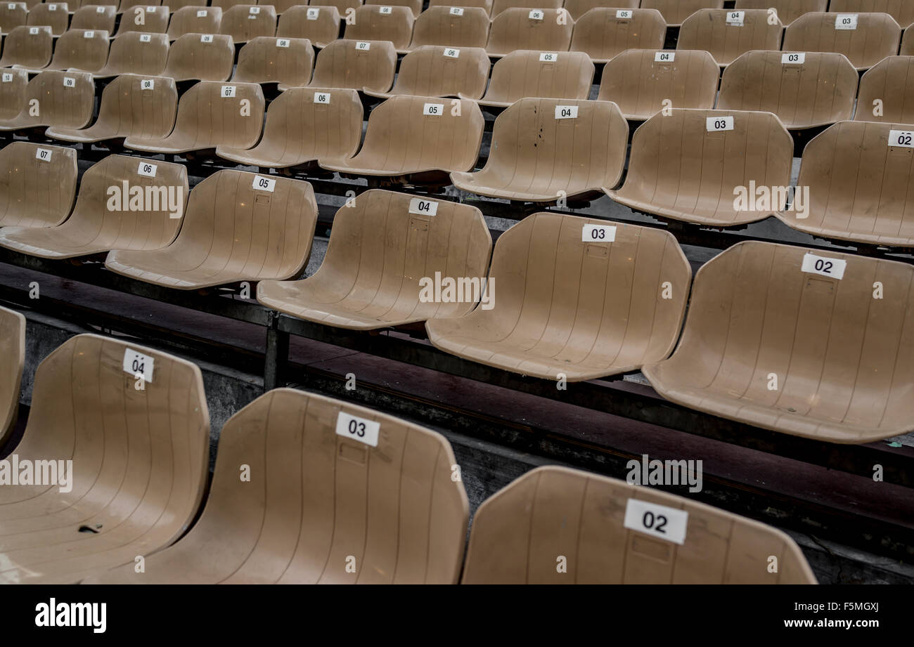 Rows of empty stadium seats Stock Photo