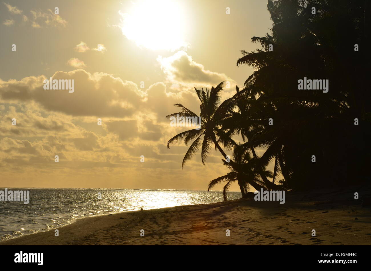Tropical sunset, Cook Islands, Pacific Ocean Stock Photo