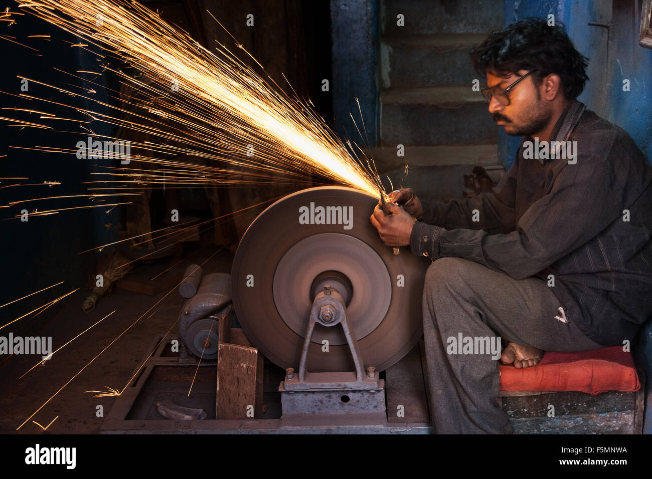 Sharpening tools in India the traditional way Stock Photo Alamy