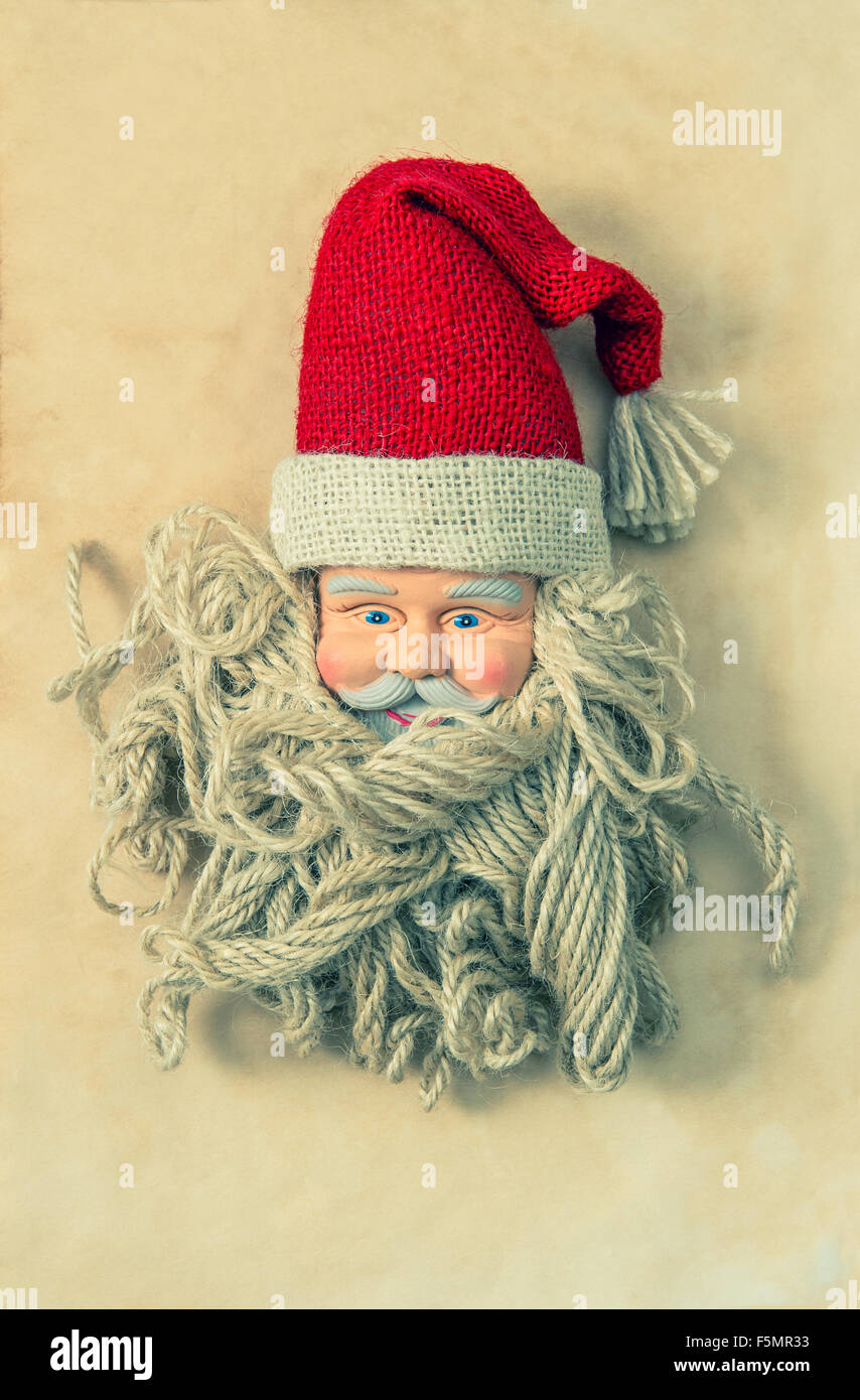 Vintage Santa Claus. Nostalgic christmas decoration. Vintage style toned. No name toy Stock Photo