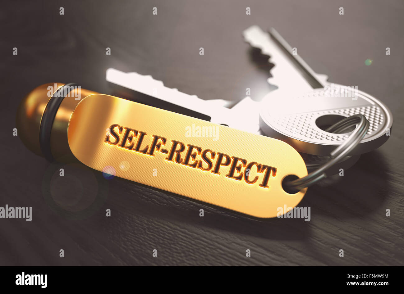 Keys and Golden Keyring with the Word Self-Respect over Black Wooden Table with Blur Effect. Toned Image. Stock Photo