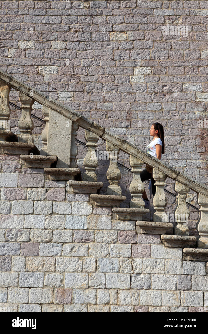 Girl walking up stairs outside hi-res stock photography and images - Alamy