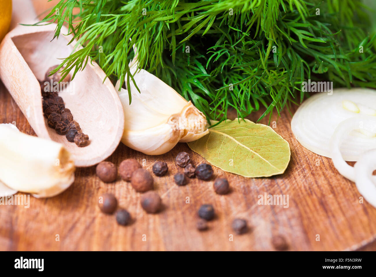 Aromatic herbs and spices on a table close-up Stock Photo