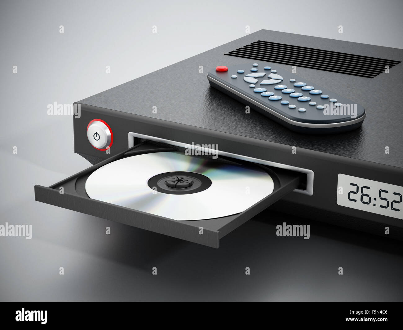 Bluray player with open disc tray and remote controller Stock Photo