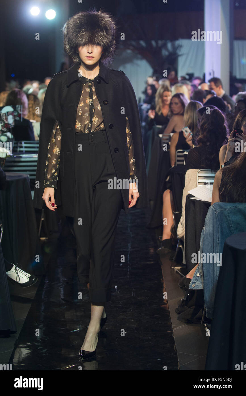 Calgary, Alberta, Canada. 6th Nov, 2015. A female model walks the Catwalk at HOLT RENFREW's Fashion Gala in Calgary wearing pants by PINK TARTAN, a shirt by THE KOOPLES, a Jacket by RED VALENTINO & topping her outfit off with a hat by ABC FUR. Credit:  Baden Roth/ZUMA Wire/Alamy Live News Stock Photo