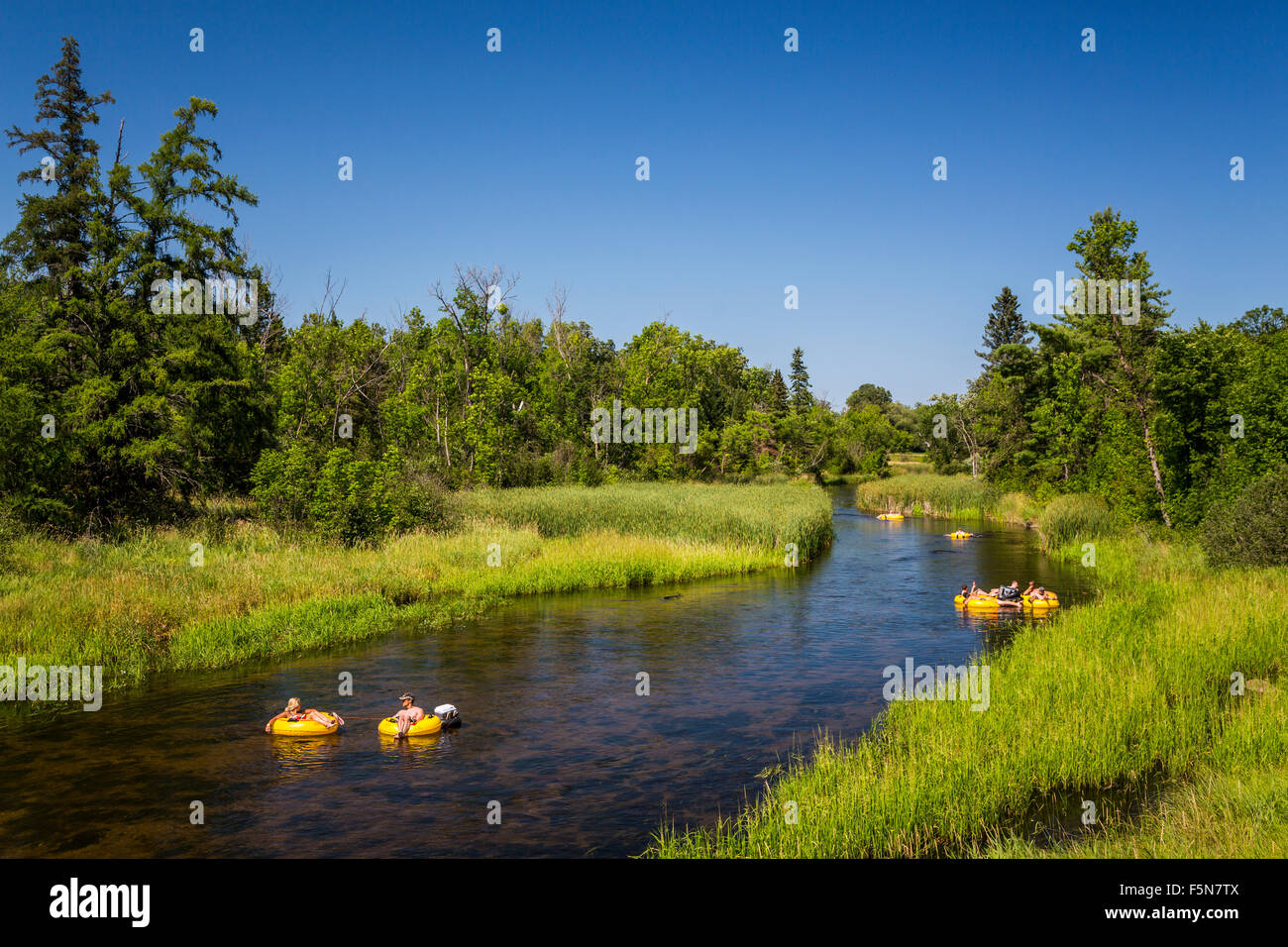 Tubing on the Otter-Tail River in Northern Minnesota, USA. Stock Photo