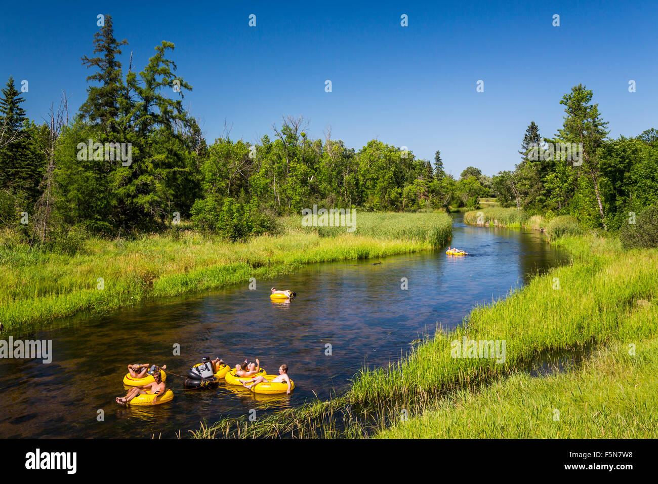 Tubing on the Otter-Tail River in Northern Minnesota, USA Stock Photo