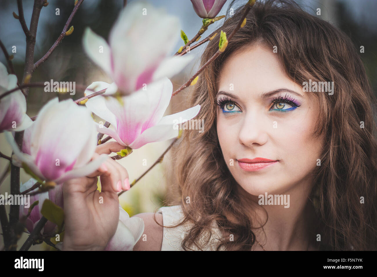 Beautiful spring girl with flowers Stock Photo