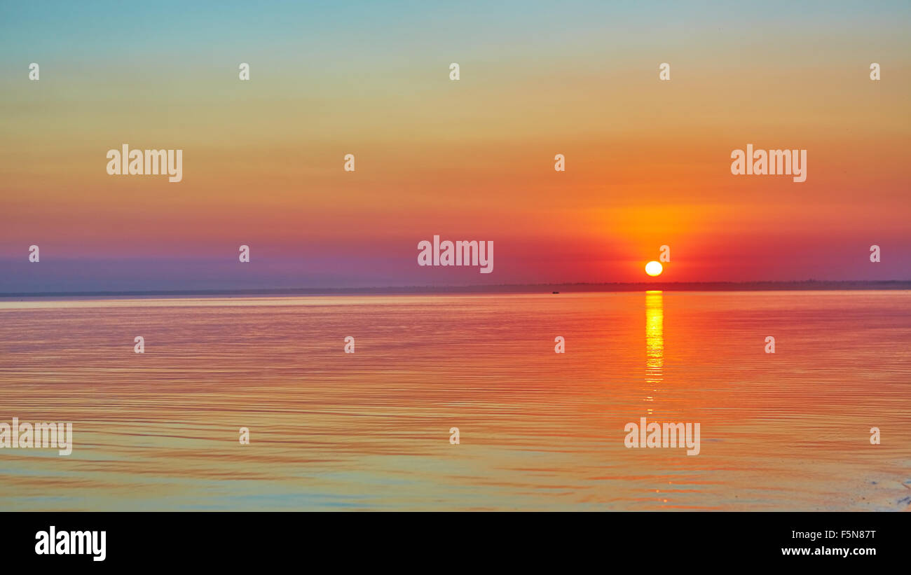 Scenic view of beautiful sunset above the sea Stock Photo - Alamy
