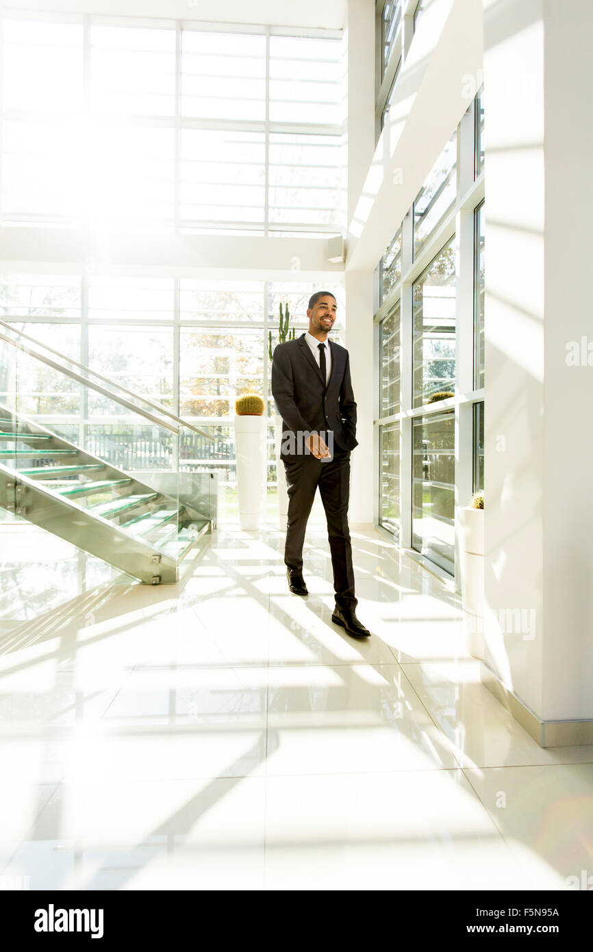 Confident young black man walking hi-res stock photography and images ...