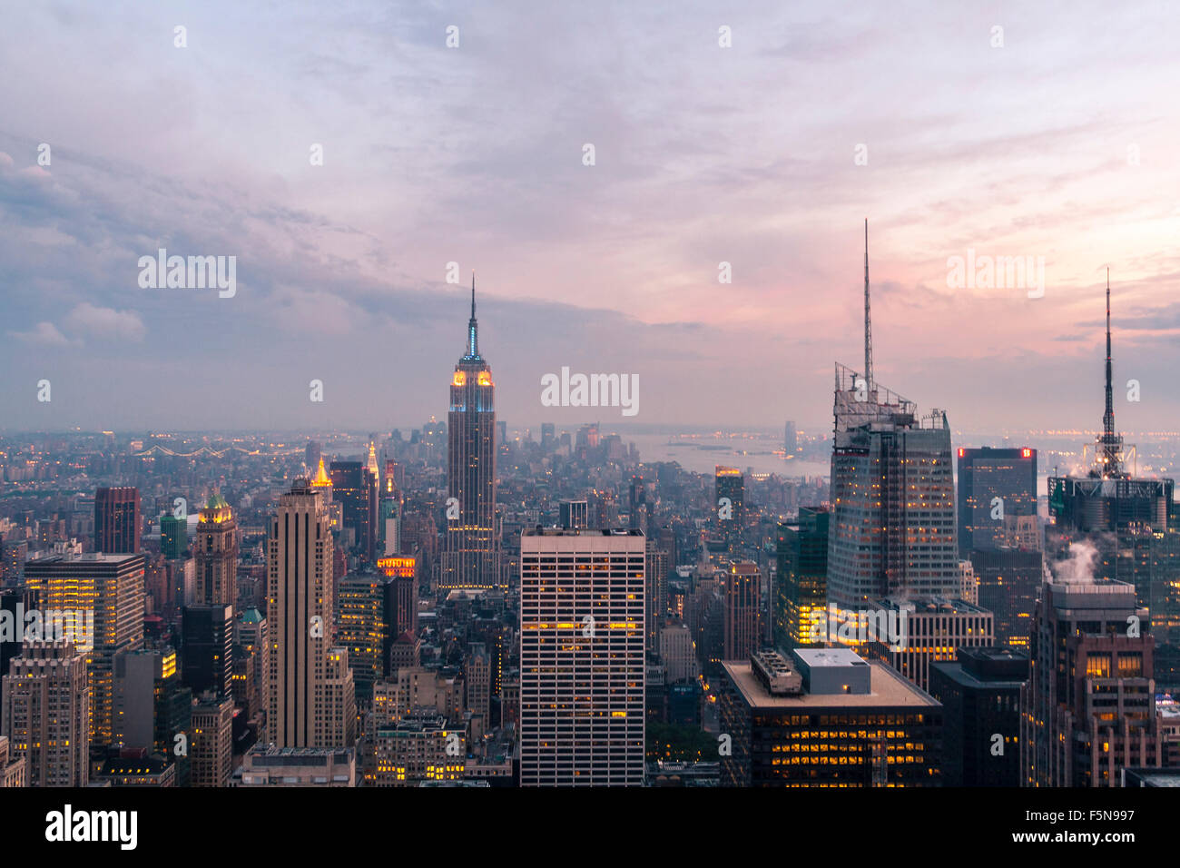 New York City skyline with urban skyscrapers at sunset. Stock Photo