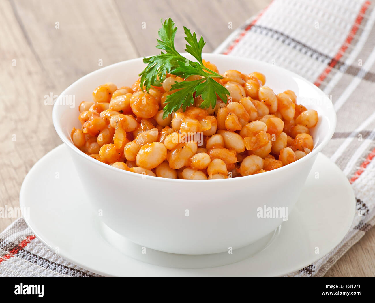 Stewed white beans in tomato sauce Stock Photo Alamy