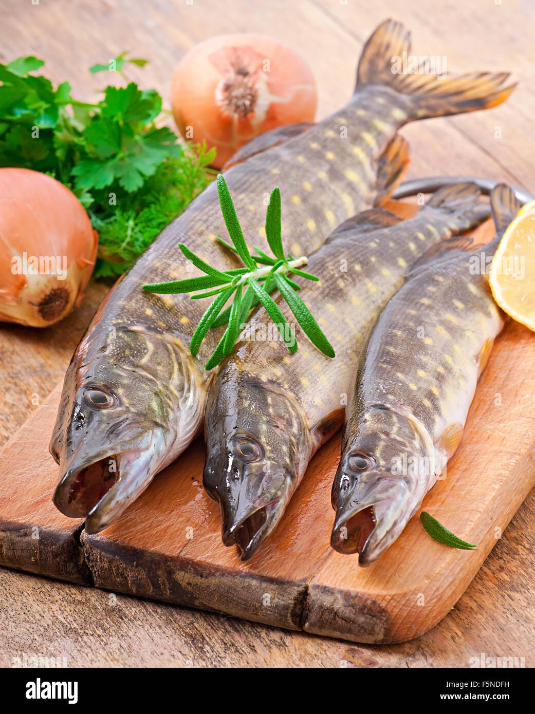 Pike raw fish preparation to baking in the kitchen Stock Photo - Alamy