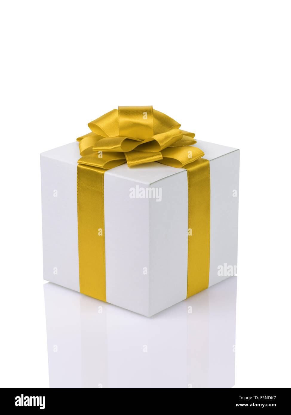 white paper gift box with yellow ribbon bow isolated Stock Photo