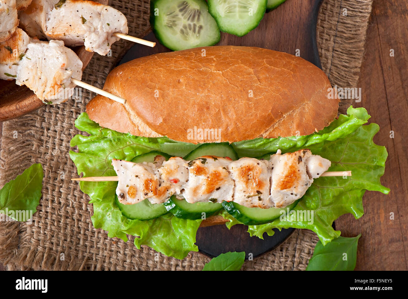 Big sandwich with chicken kebab and lettuce Stock Photo Alamy