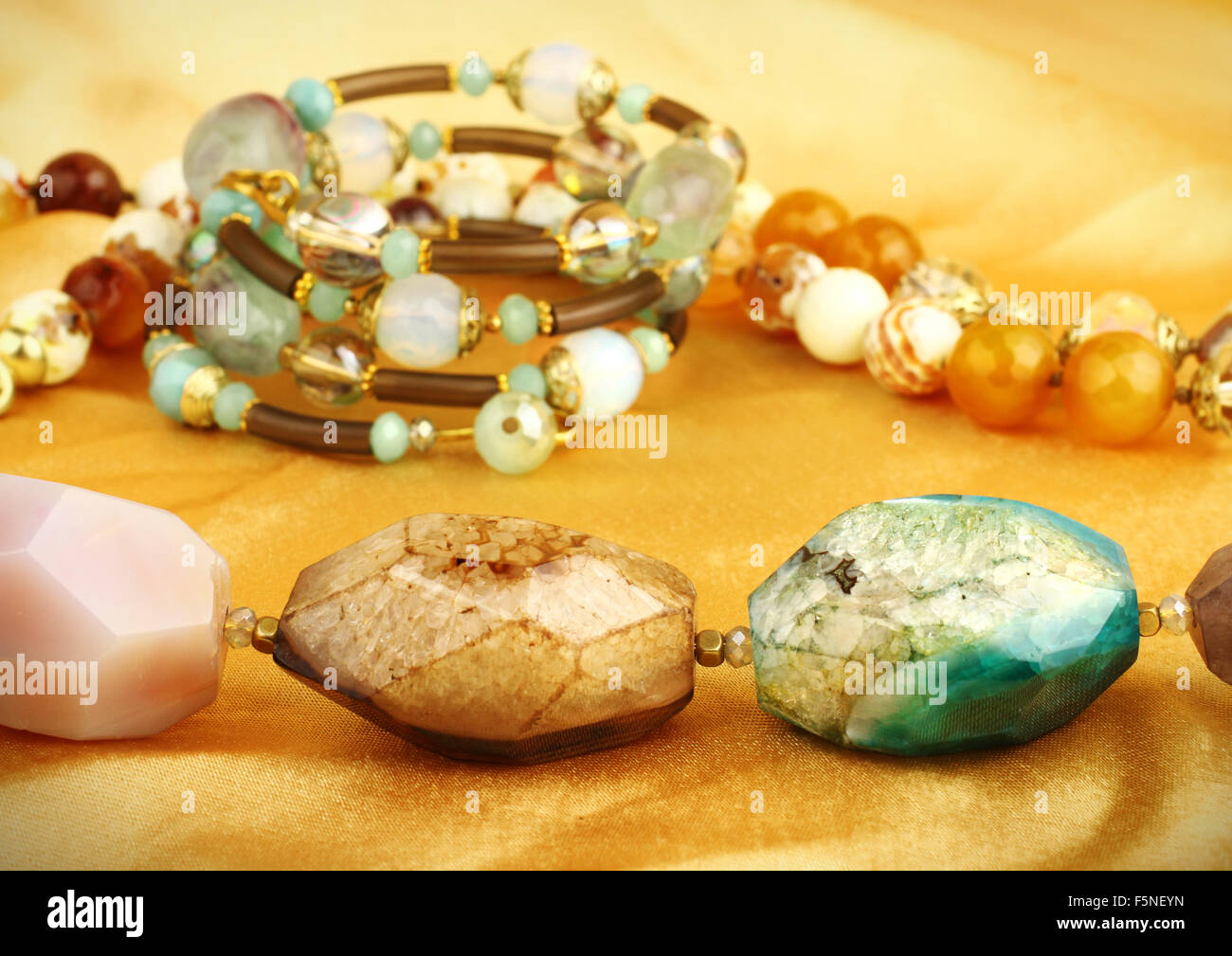 jewelry gems on golden background Stock Photo