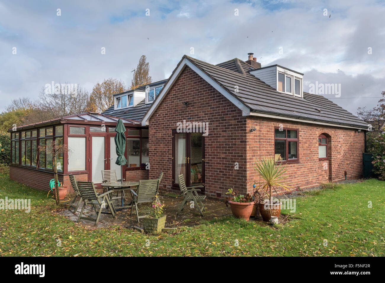 Typical Dormer Bungalow In Middle Class England With Conservatory