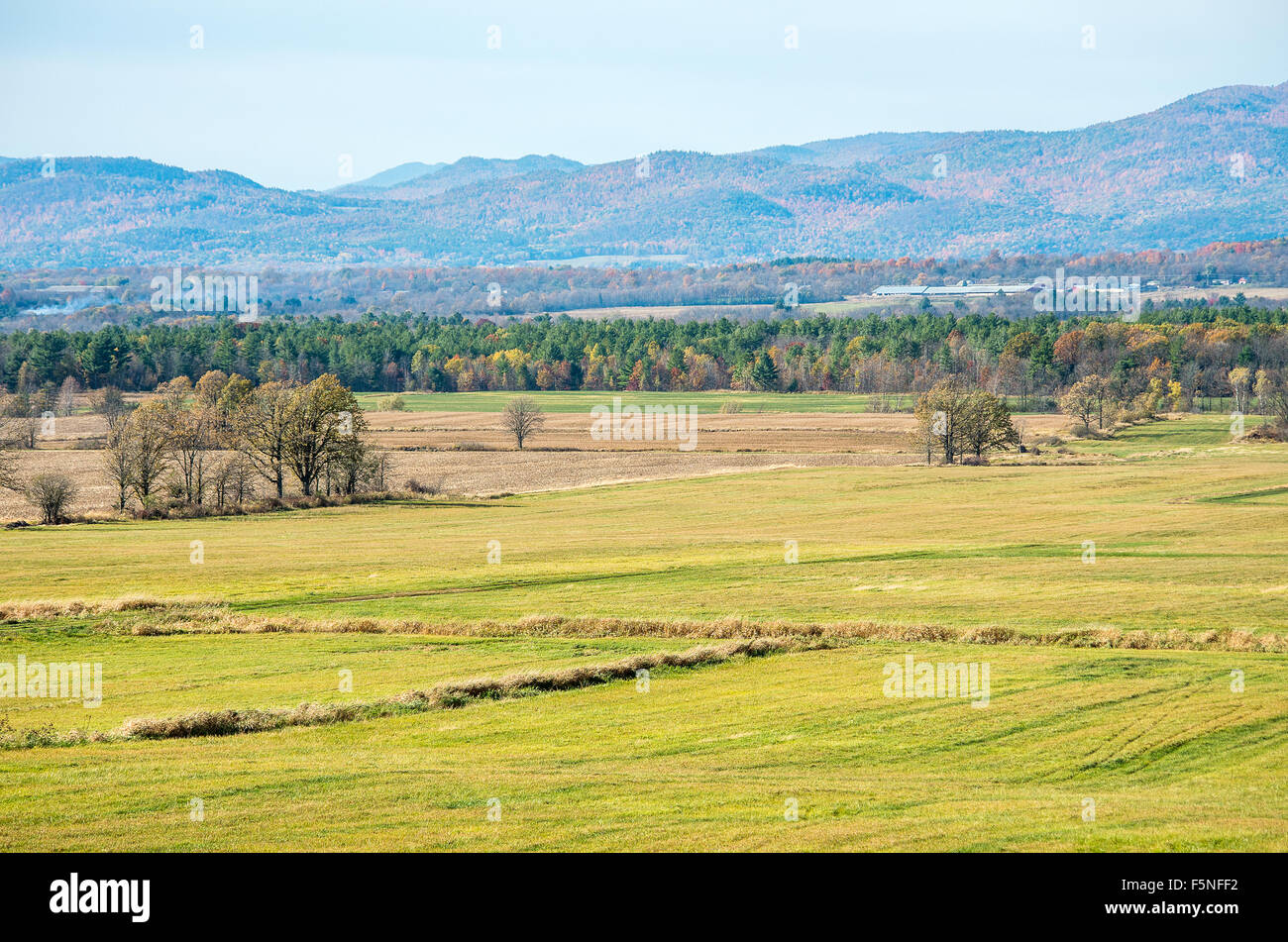 Vermont pastures with mountains in the background Stock Photo