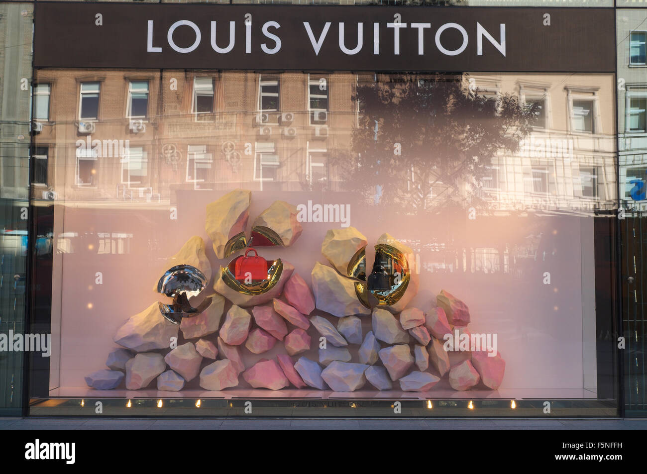 Louis Vuitton shop store window display of shoes and handbags on Al Stock Photo - Alamy