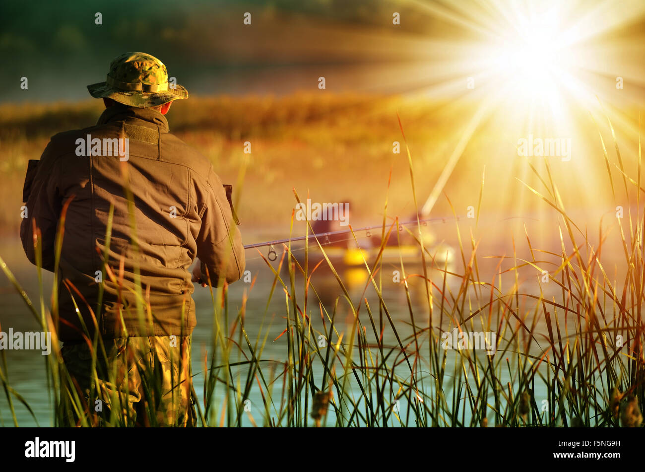 Fisherman catches fish hi-res stock photography and images - Alamy