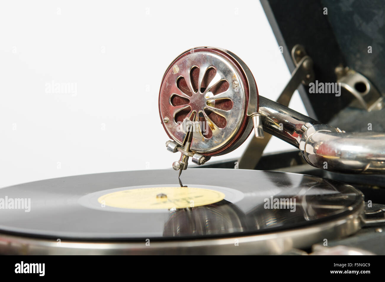 Old gramophone, a mechanical device for playing phonograph records,  isolated on a white background Stock Photo - Alamy