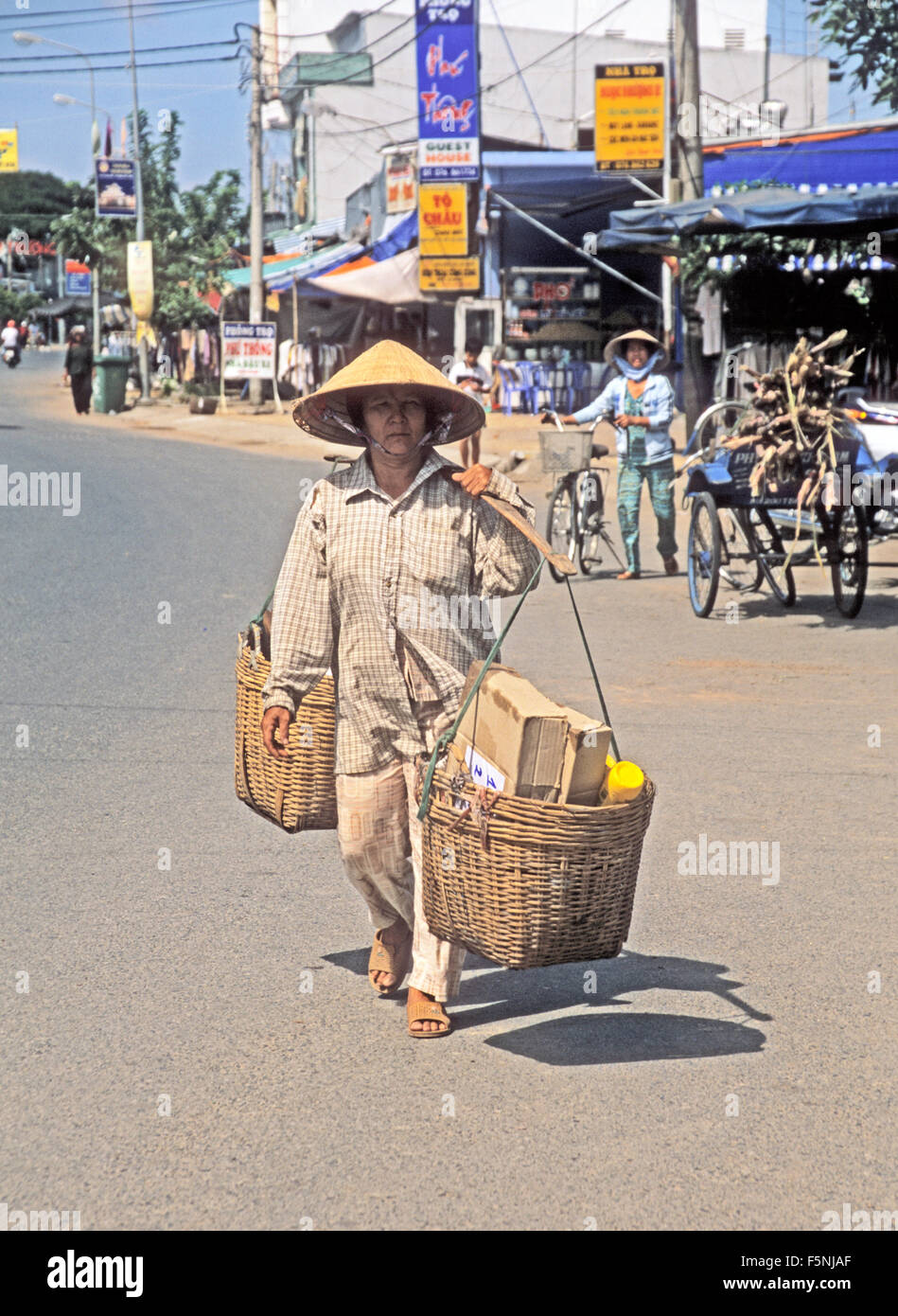 Vietnam Chao Doc Yoke Basket wearing Conical Hat Stock Photo Alamy