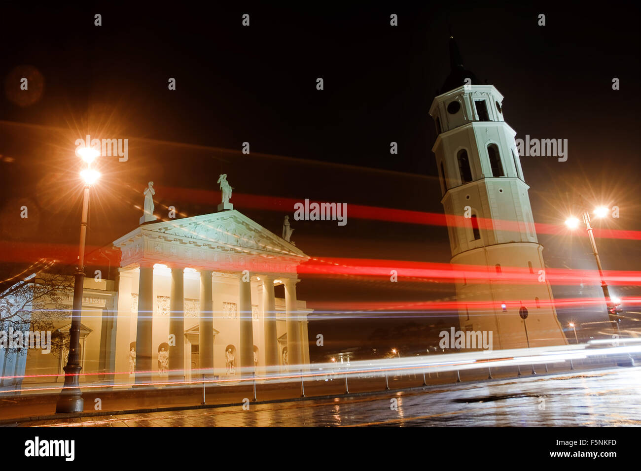 Cathedral of Vilnius in the night with lamp of car Stock Photo