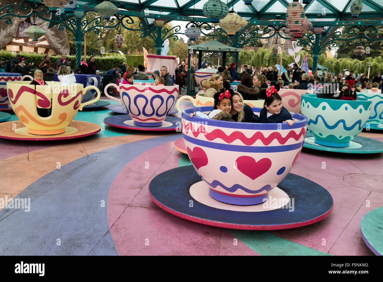 The Mad Hatter's tea cups, Disneyland Paris theme park, Marne-la-Vallée, Île-de-France, France Stock Photo