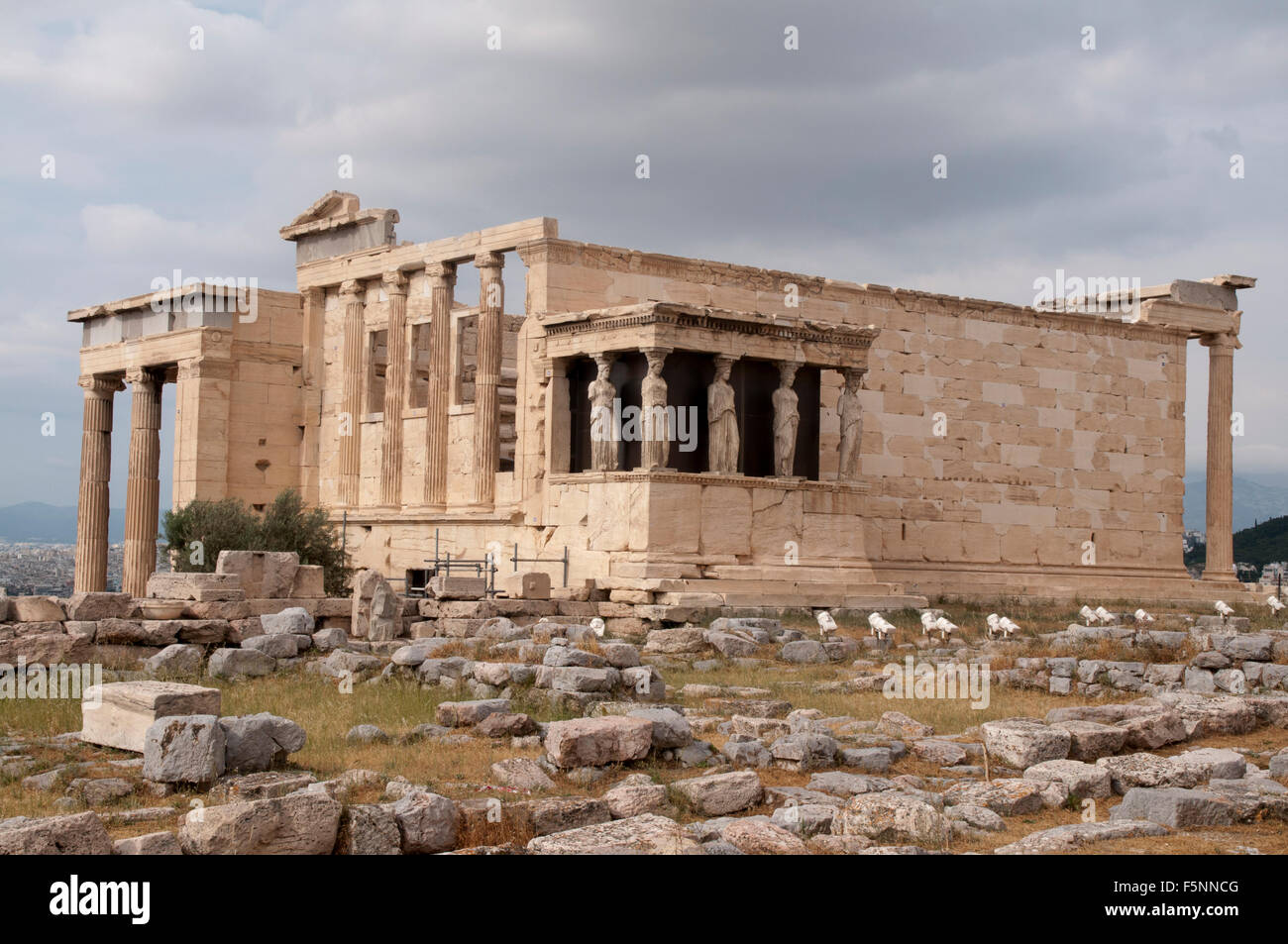 The Erechtheion is an ancient Greek temple built between 421 and 406 BC on the north side of the Acropolis of Athens. Stock Photo
