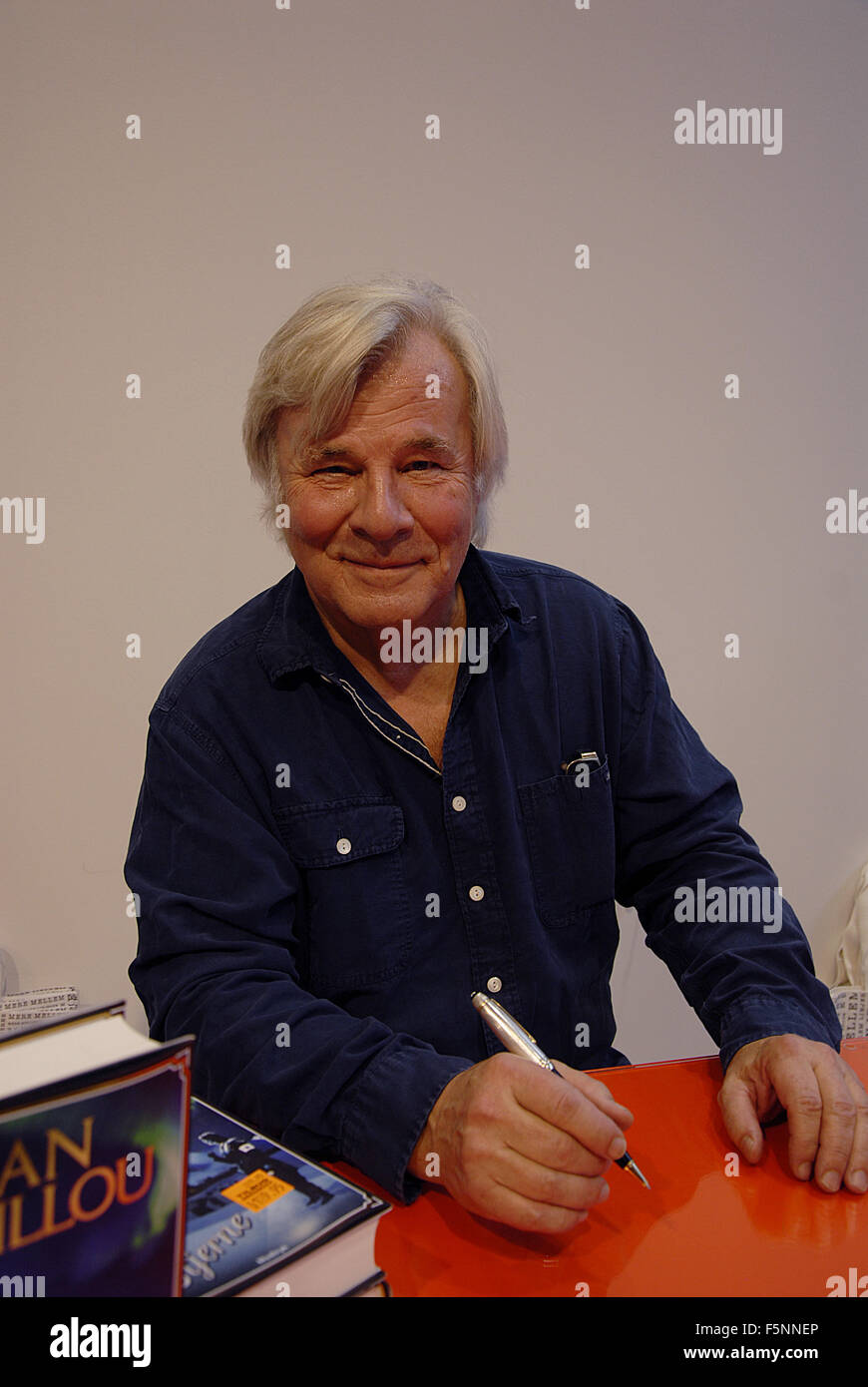 Copenhagen, Denmark. 07th Nov, 2015. Swedish born author Jan Guillou signs his new book at Copenhagen Book Fair 2015 in Bella Center. Credit:  Francis Dean/Alamy Live News Stock Photo