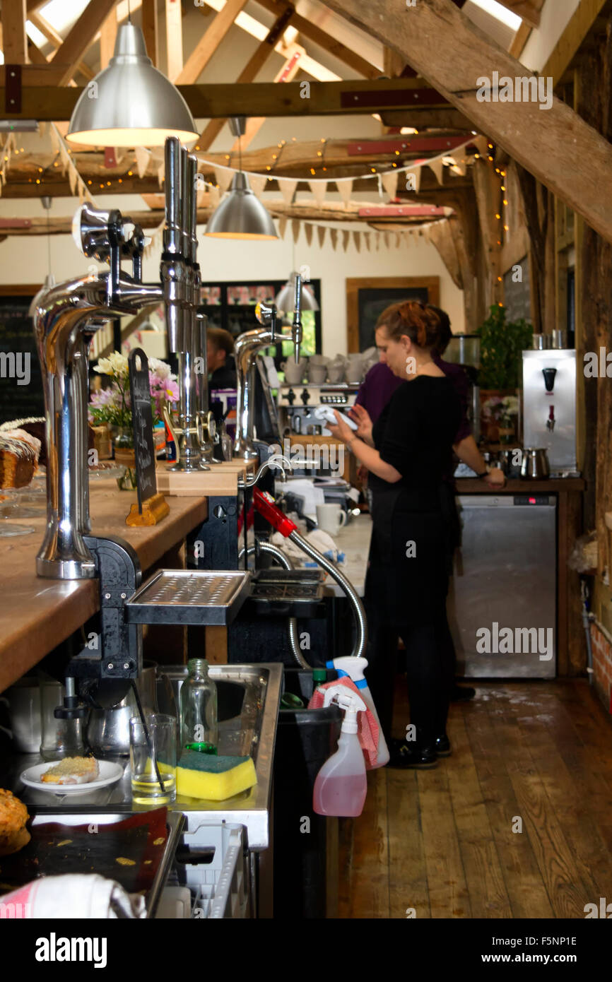 Bar with staff, Jimmy's Farm, Wherstead, Ipswich, Suffolk, UK Stock Photo