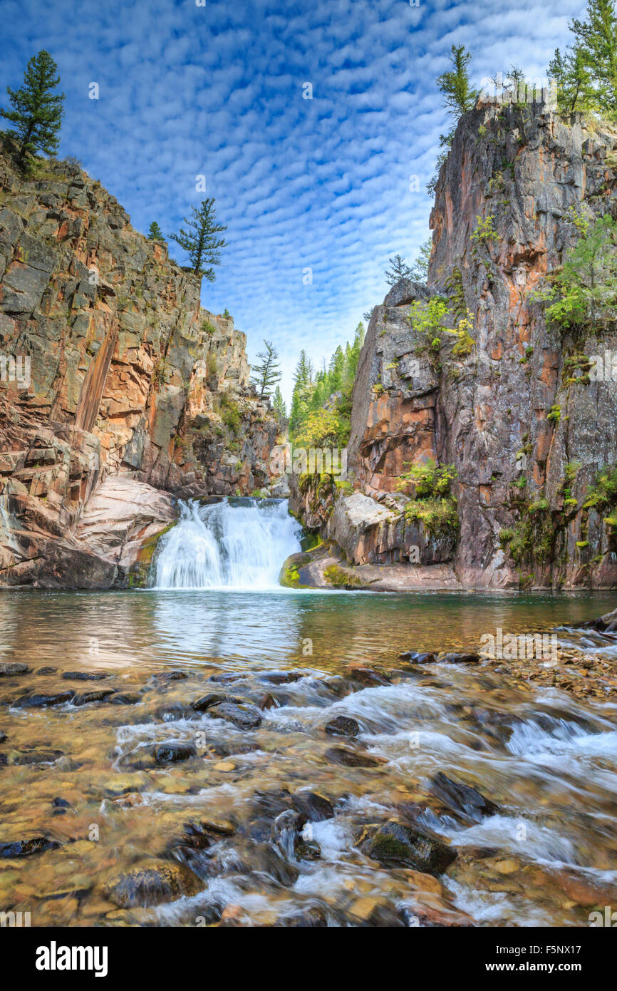 secluded waterfall along tenderfoot creek in the little belt mountains near white sulphur springs, montana Stock Photo