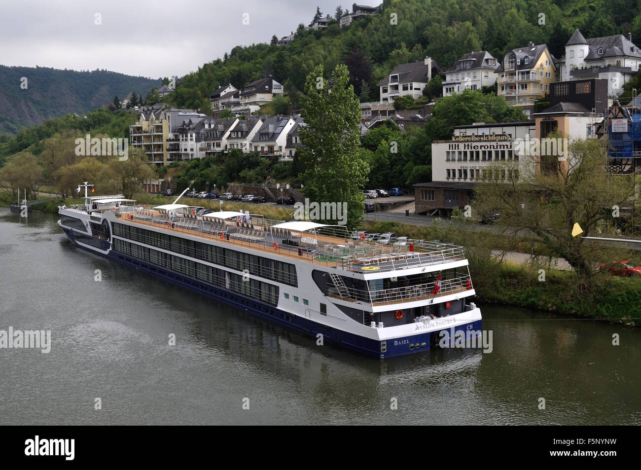 River cruise ship Avalon Poetry II, registered in Basel, Switzerland, moored on the Moselle River at Cochem, Germany. Stock Photo