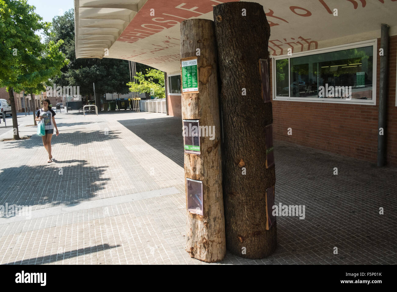 Innovative idea,used,recycled,books being available in a, tree, outside, Public library,Terrassa a city, in Barcelona province,Catalonia,Spain. Stock Photo