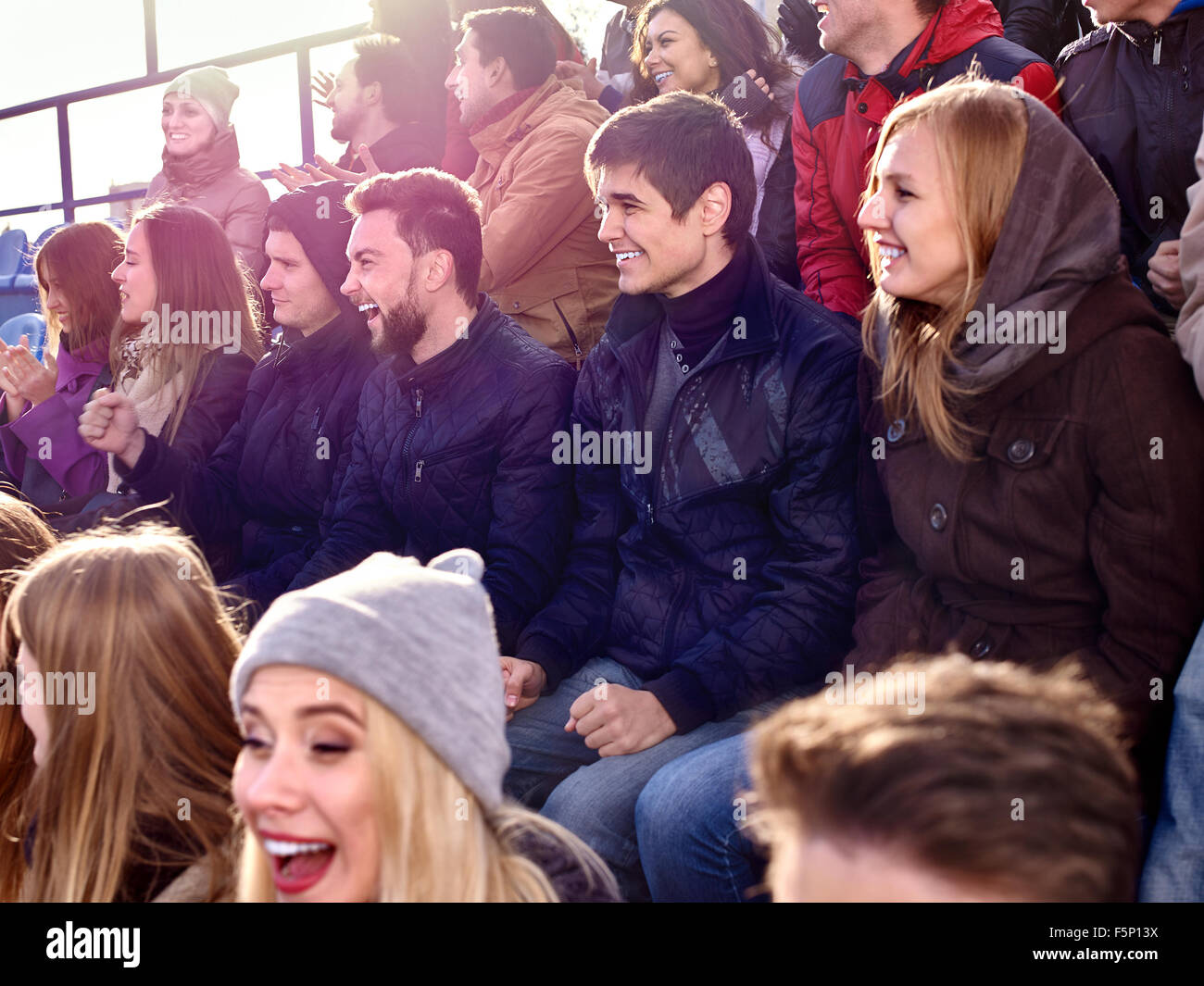 Sport fans clapping and singing on tribunes Stock Photo Alamy