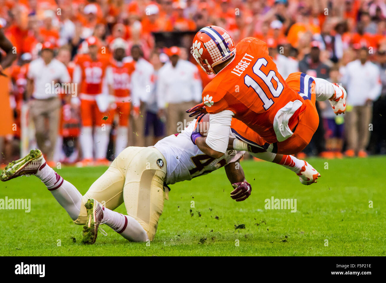 Clemson Tigers tight end Jordan Leggett (16) is tackled by Florida State  Seminoles defensive back Lamarcus Brutus (42) during the NCAA Football game  between Florida State and Clemson at Death Valley in