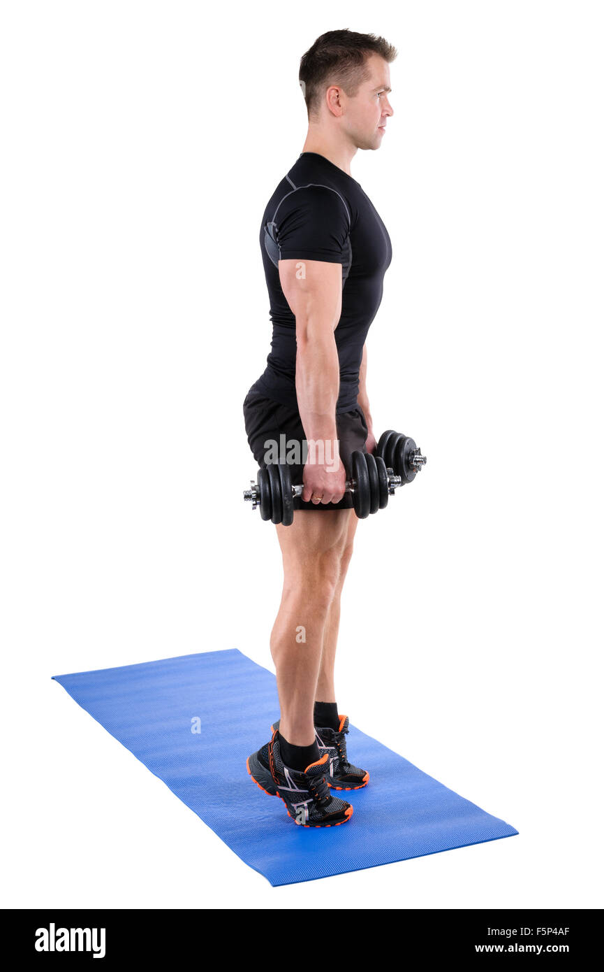Standing Dumbbell Calf Raise with Dumbbels workout Stock Photo