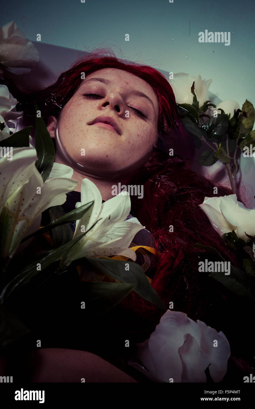 young girl lying in water, romantic scene Stock Photo - Alamy