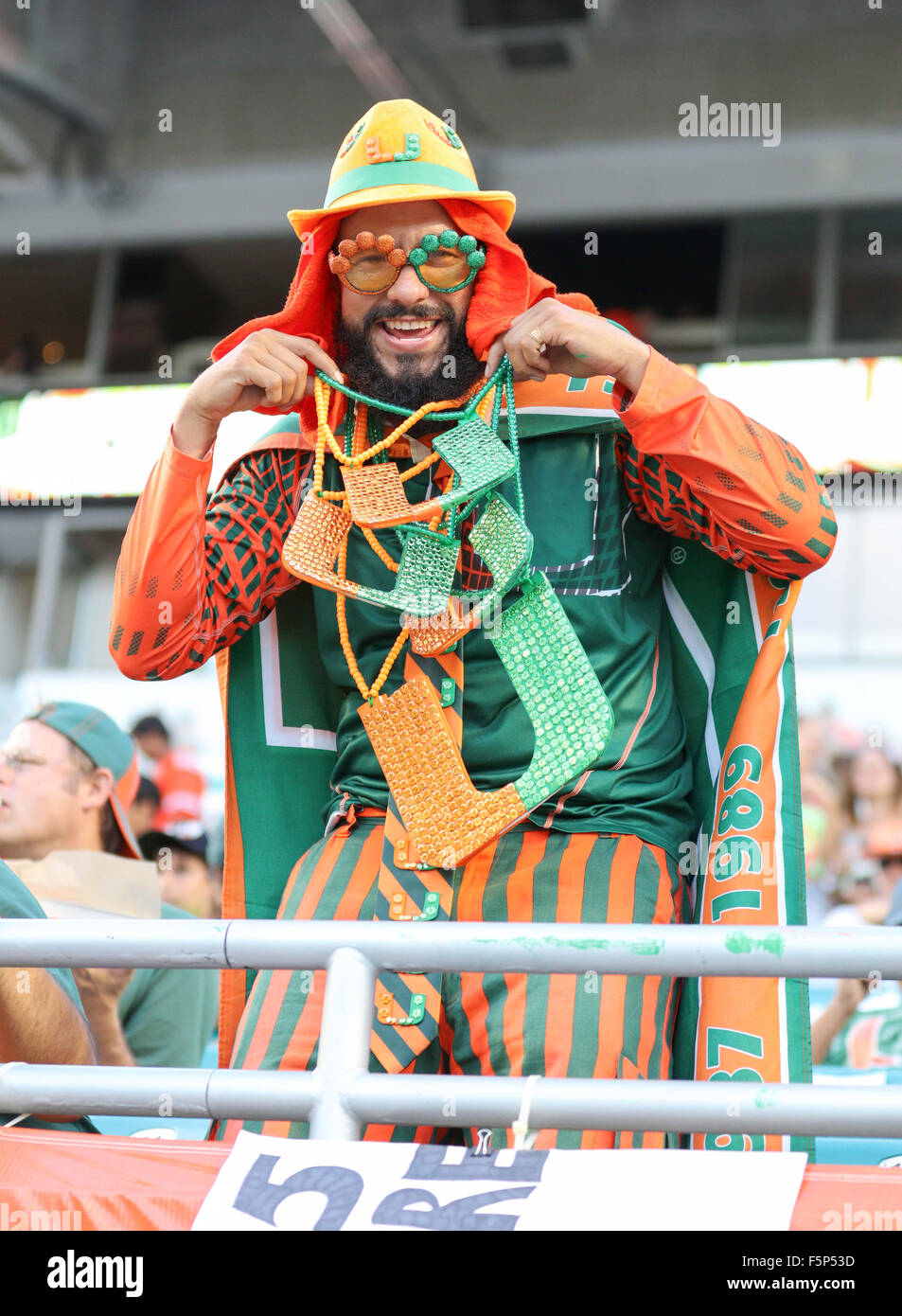 Miami Gardens, FL, USA. 7th Nov, 2015. An enthusiastic Maimi fan in the stands during the NCAA football game between the Miami Hurricanes and the Virginia Cavaliers at Sun Life Stadium in Miami Gardens, FL. Kyle Okita/CSM/Alamy Live News Stock Photo