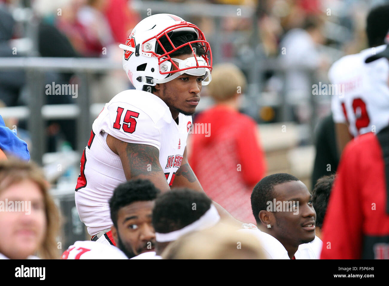 Chestnut Hill, USA. 7th Nov, 2015. MA, USA; North Carolina State Wolfpack wide receiver Johnathan Alston (15) on the sideline during the first half of the NCAA football game between the Boston College Eagles and North Carolina State Wolfpack at Alumni Stadium. North Carolina State defeated Boston College 24-8. Anthony Nesmith/Cal Sport Media/Alamy Live News Stock Photo