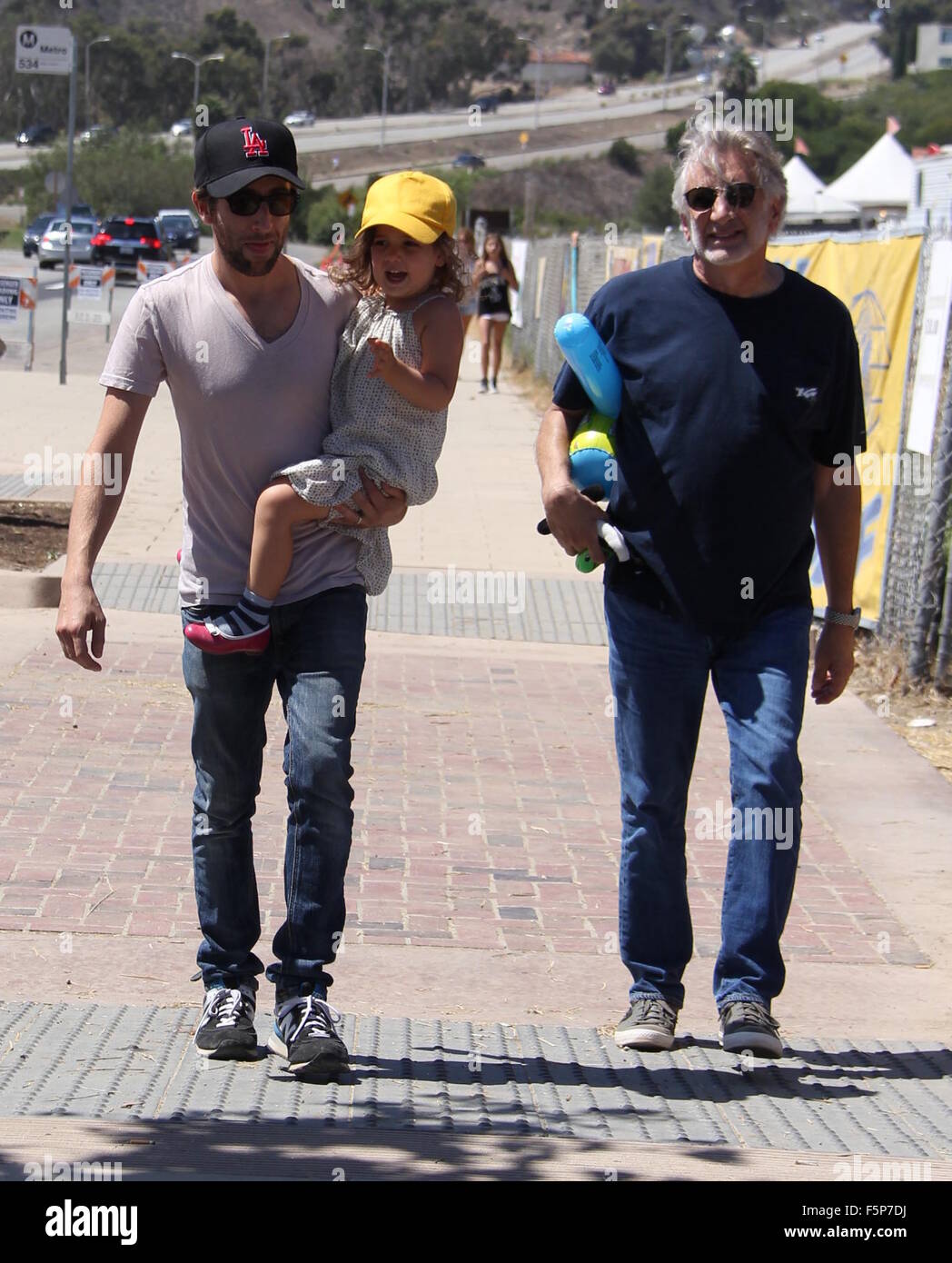 Big Bang Theory' star Simon Helberg carries his daughter in his arms as  they go out and about in Malibu with his father Featuring: Simon Helberg,  Adeline Helberg, Sandy Helberg Where: Los